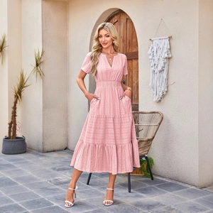 Pink V-neck short sleeve dress with tiered cake skirt and bohemian high waist details