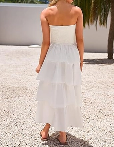Detail of white tiered strapless maxi dress with elastic smocking at the back