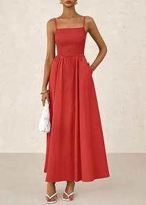 Close-up of smocked bodice and spaghetti straps on the red summer maxi dress