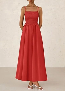 Close-up of smocked bodice and square neck details on dark red maxi strap dress