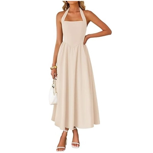 Elegant beige halter neck maxi dress with pleated waist and A-line skirt on model