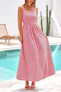 Close-up of pink gingham maxi dress featuring a square neck and smocked waist detail