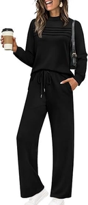 Détail de l'ensemble sweat noir à manches longues avec texture plissée et taille à cordon