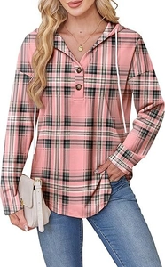 Detail view of the V-neck with buttons and pink plaid pattern on the hooded sweatshirt