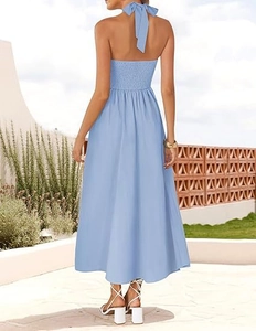 Close-up of the light blue halter neck tie and smocked back detail on summer midi dress