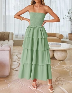 Detail of smocked strapless sage green maxi dress featuring a four-tier layered ruffle skirt