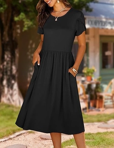 Detail of a casual black short sleeve dress with round neck and practical side pockets