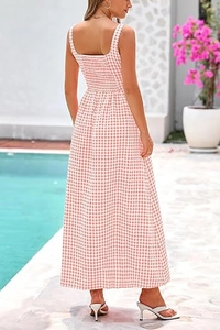 Detail of the pink and white plaid maxi dress showing the smocked elastic back design