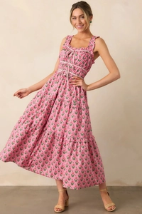 Detailed macro view of the floral print summer dress featuring a layered tiered skirt design