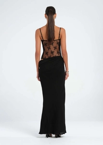 Close-up of the elegant back design with semi-transparent black floral lace stitching