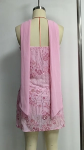 Detailed back view of pink sequin floral embroidery mini dress with chiffon cape