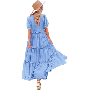 Sky blue boho tiered maxi dress with puff sleeves and pleated texture for summer vacation