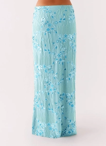 Detailed view of pale blue sequins and intricate beadwork embroidery on the maxi skirt