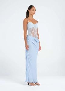 Detail view of the lace embroidery and side ruching on this light blue long dress