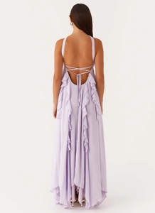 Detail of lavender chiffon backless maxi dress with cross ties and ruffle accents