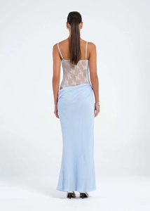 Detail of light blue lace patchwork top and long wrap skirt back view design