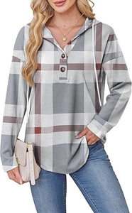 Detail of V-neck button closure and plaid hood texture on casual long sleeve hoodie