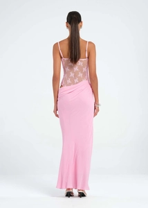 Detail of the sheer floral lace back design on this elegant pink mermaid dress