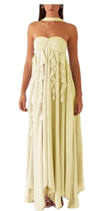 Detail of light yellow chiffon dress with layered ruffles and backless halter neck