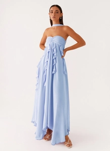 Detail of light blue chiffon maxi dress with cascading ruffles and halter neck design