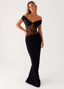 Close-up of the delicate sheer floral lace bodice and elegant gathered waist detailing