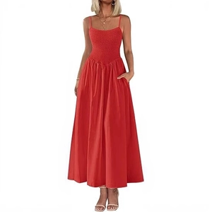 Elegant bright red smocked bodice maxi dress with spaghetti straps and side pockets
