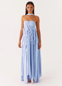 Detail of light blue chiffon halter dress featuring layered ruffle bodice and soft texture
