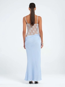 Back view of a light blue lace patchwork maxi dress with fine floral embroidery and slim fit