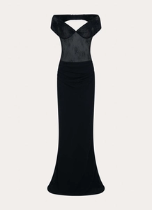 Close-up of black lace floral detail and ruched waist on a slim fit bodycon maxi dress