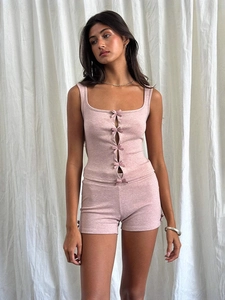 Women pink knit two-piece lounge set with bow details and square neck tank top