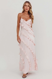 Detailed close-up of pink V-neck tiered ruffle dress with delicate spaghetti straps
