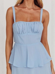 Light blue backless camisole dress with tiered ruffles and pleated details for evening parties