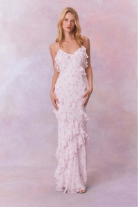Detail of French floral maxi dress with layered ruffles and delicate purple flower patterns
