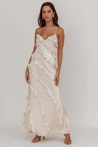 Detail of champagne satin maxi dress featuring elegant ruffle layers and thin straps