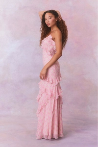 Detailed layers of ruffles on a floral pink chiffon maxi dress with delicate straps