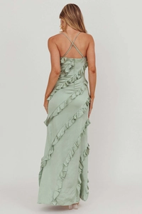 Detail of cross back straps and cascading ruffles on a light green satin maxi dress