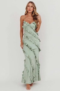 Detail of sage green satin long dress featuring layered ruffles and delicate spaghetti straps