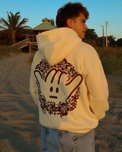 Detailed back view of off-white oversized hoodie with floral sunset embroidery
