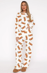 Detail of soft white loungewear set with festive orange BOO Halloween print and ghost icons
