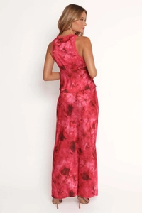 Back view of a sexy floral halter dress with lightweight fabric and romantic design