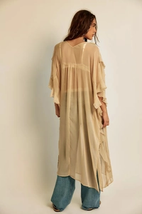 Detail of champagne sheer chiffon cardigan with ruffled sleeves and layered hemline