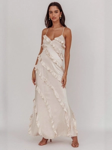 Elegant champagne satin maxi dress with ruffled tiers and delicate spaghetti straps