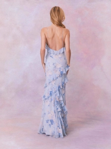 Light blue floral chiffon dress featuring a backless design and cascading ruffles