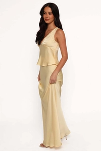 Close-up of cream satin long skirt set showing silky texture and delicate lace V-neckline
