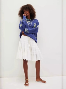 Women's vintage purple knit sweater with sun seahorse graphic and white tiered skirt