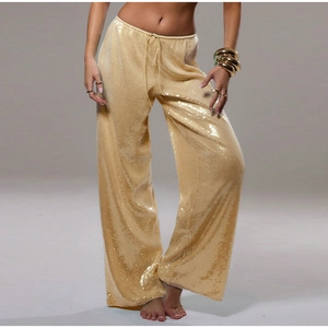 Détail du pantalon large à paillettes dorées avec taille haute élastique et cordon de serrage
