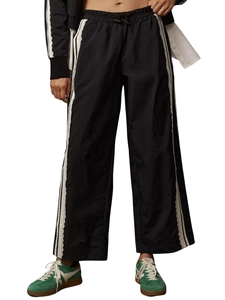 Women's black wide-leg joggers with lace trim and side stripes in a relaxed high-waist fit