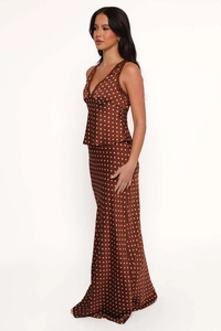 Detailed view of brown polka dot satin set with lace trim and elegant fish tail silhouette