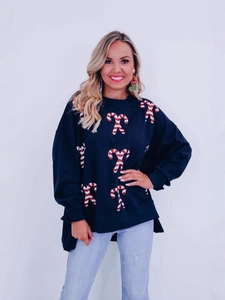 Women's loose Christmas sweatshirt in navy blue with festive candy cane sequins