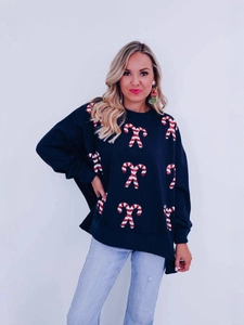 Women's navy blue Christmas candy cane sequin sweatshirt in loose fit and casual style